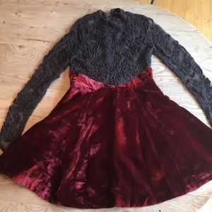 High necked, intricately beaded Free People dress.